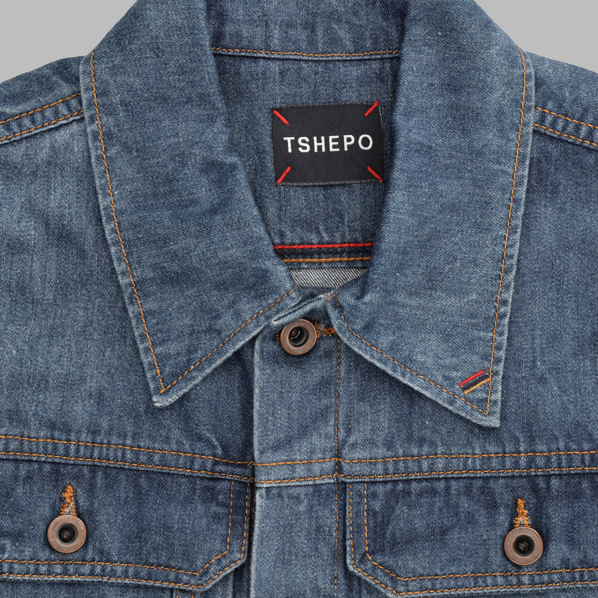 Teshepo denim jacket flat lay photography